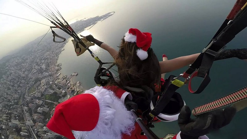 In Video: Paragliding Santa Claus rescued after getting caught In power lines